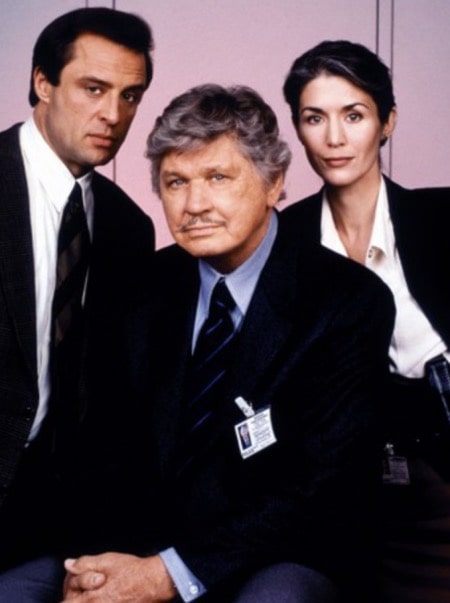 Charles Bronson (center) and Kim Weeks (right) in a still from 'Breach of Faith: A Family of Cops II', with Joe Penny on the left